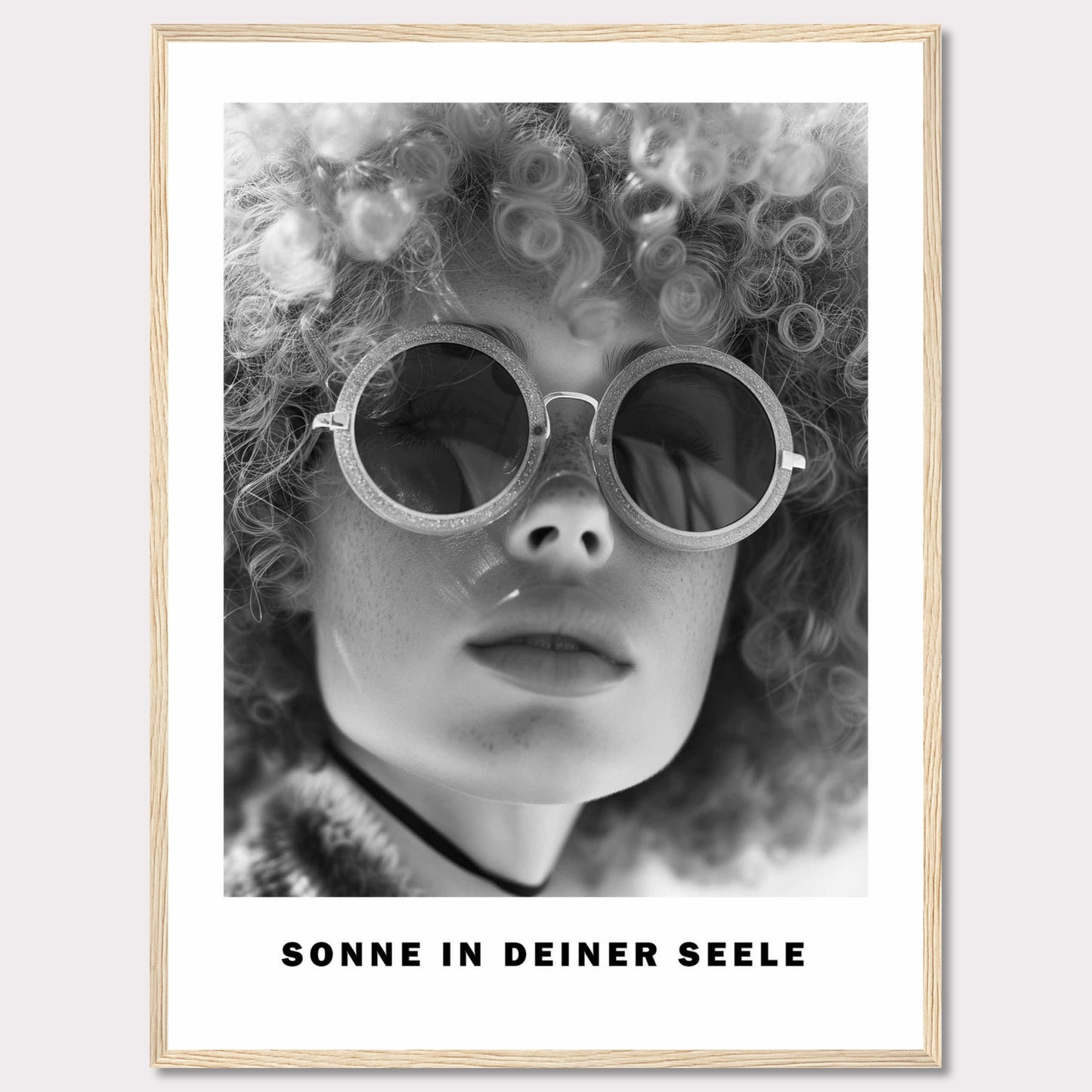 This black-and-white poster features a close-up of a person with curly hair wearing round sunglasses. The text at the bottom reads "SONNE IN DEINER SEELE," which translates to "Sun in Your Soul."