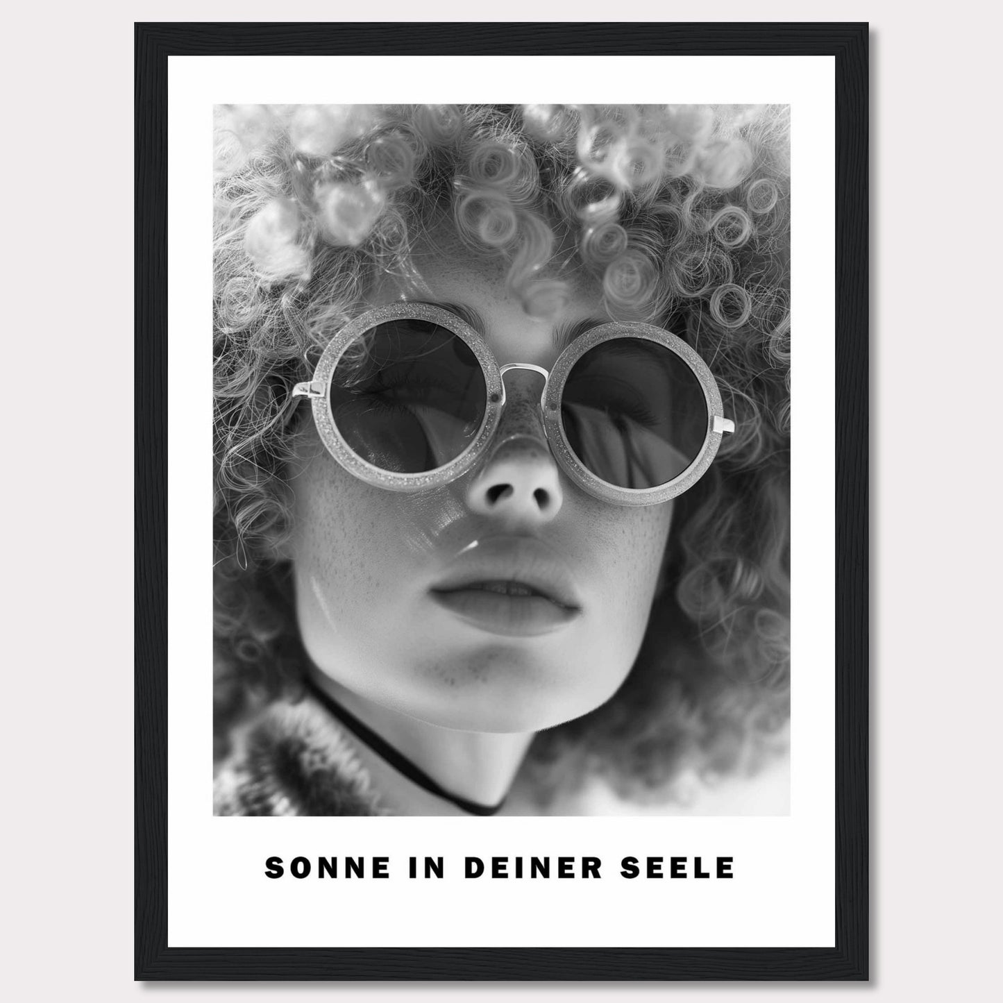 This black-and-white poster features a close-up of a person with curly hair wearing round sunglasses. The text at the bottom reads "SONNE IN DEINER SEELE," which translates to "Sun in Your Soul."