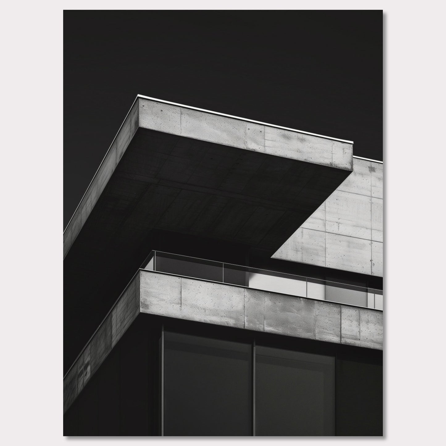 This striking black and white photograph captures the modern architectural lines of a concrete building against a dark background. The image highlights the stark contrast and geometric precision of contemporary design.