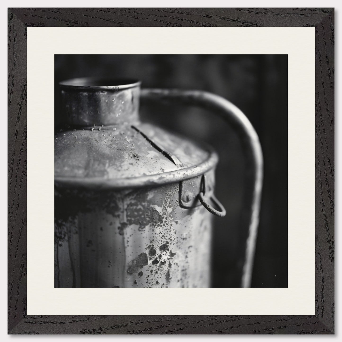 This illustration depicts a close-up view of an old, weathered metal container with a handle. The black and white composition highlights the texture and details of the rust and wear on the surface.