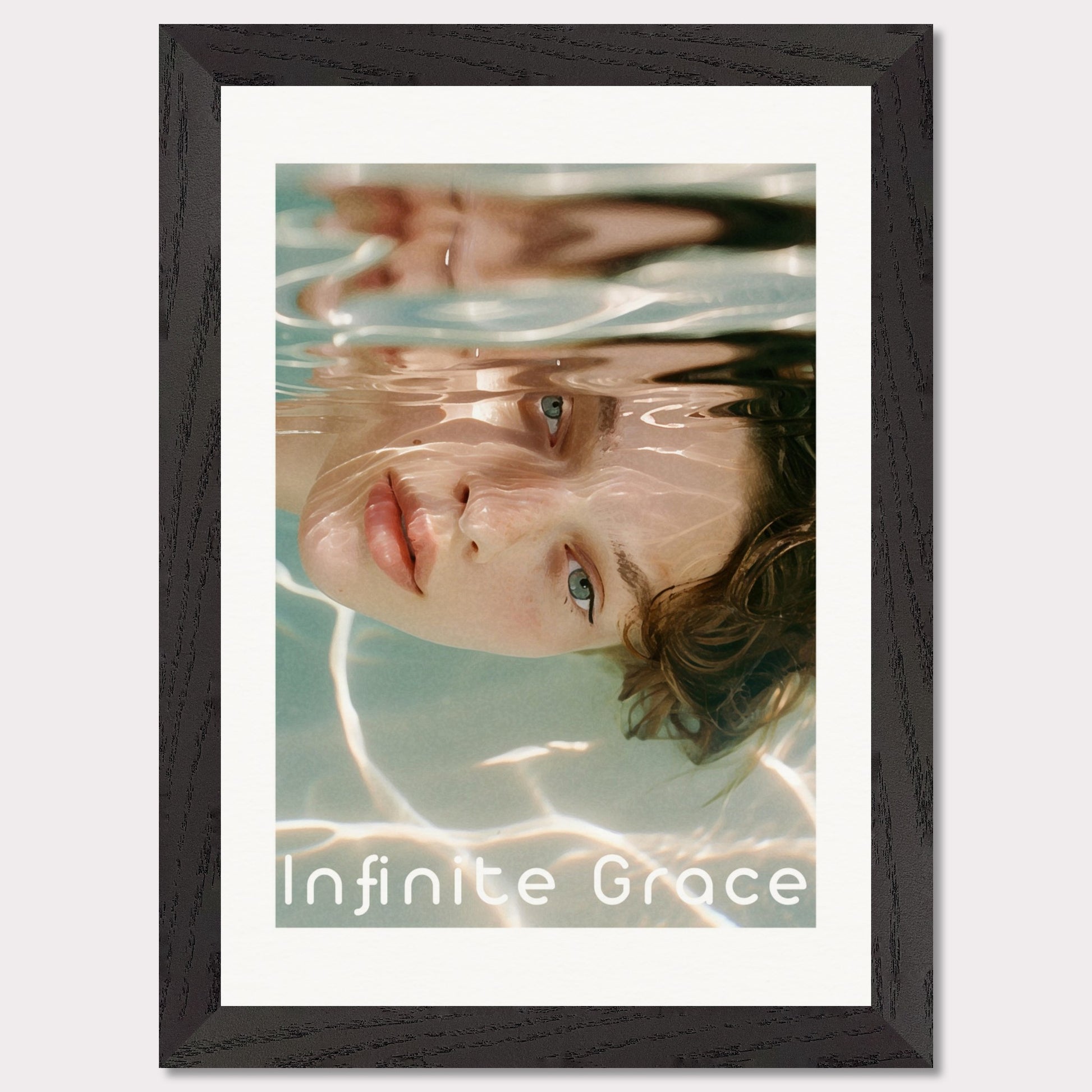 This is an illustration of a person's face partially submerged in water, creating a reflective and serene effect. The text "Infinite Grace" is displayed at the bottom of the image.

Where will this poster fit: This poster would fit well in a modern living room, a bedroom, or a creative studio space.