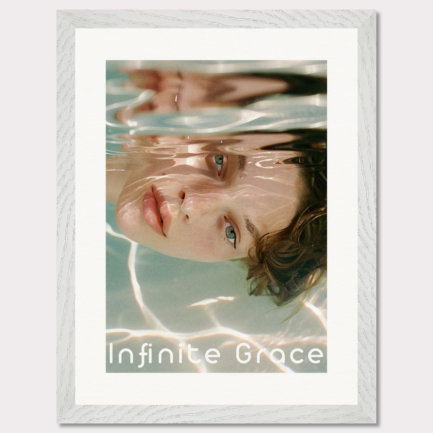 This is an illustration of a person's face partially submerged in water, creating a reflective and serene effect. The text "Infinite Grace" is displayed at the bottom of the image.

Where will this poster fit: This poster would fit well in a modern living room, a bedroom, or a creative studio space.