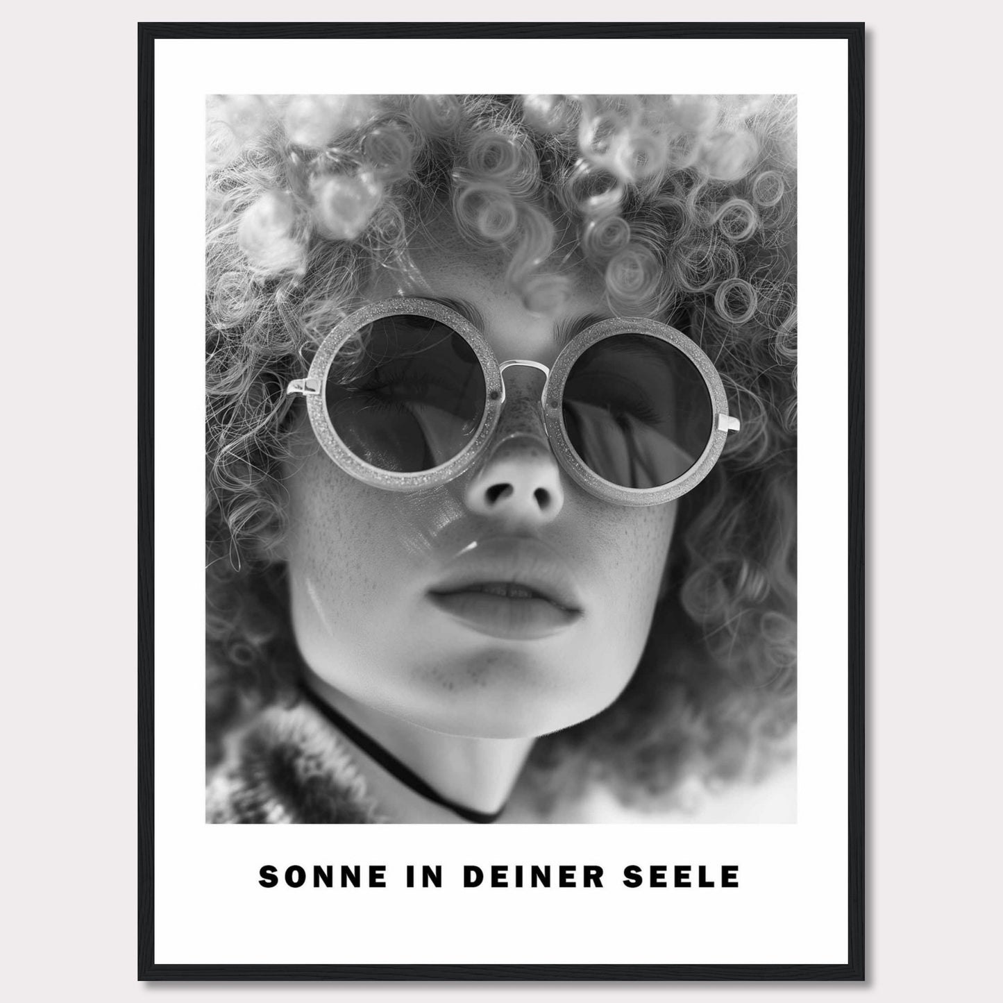 This black-and-white poster features a close-up of a person with curly hair wearing round sunglasses. The text at the bottom reads "SONNE IN DEINER SEELE," which translates to "Sun in Your Soul."