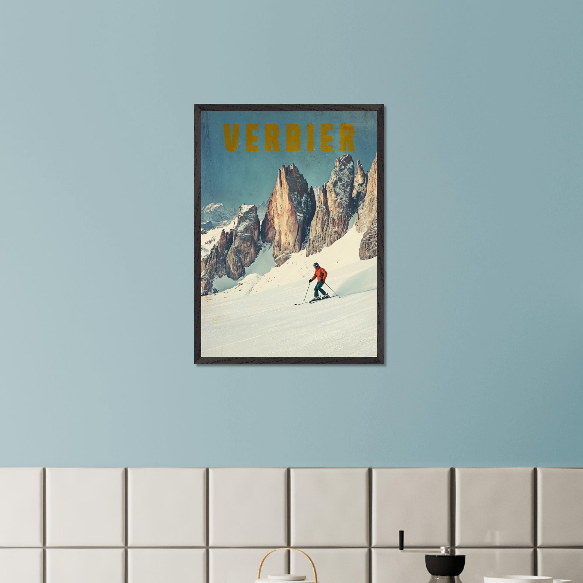 This stunning vintage poster showcases the essence of skiing in Verbier, with a lone skier carving through fresh powder beneath towering, jagged alpine peaks. The vibrant orange jacket of the skier contrasts beautifully with the crisp, snowy landscape and the rugged beauty of the mountains. The bold, retro typography reinforces the feeling of adventure and nostalgia, inviting viewers to experience the thrill of Verbier’s iconic slopes.