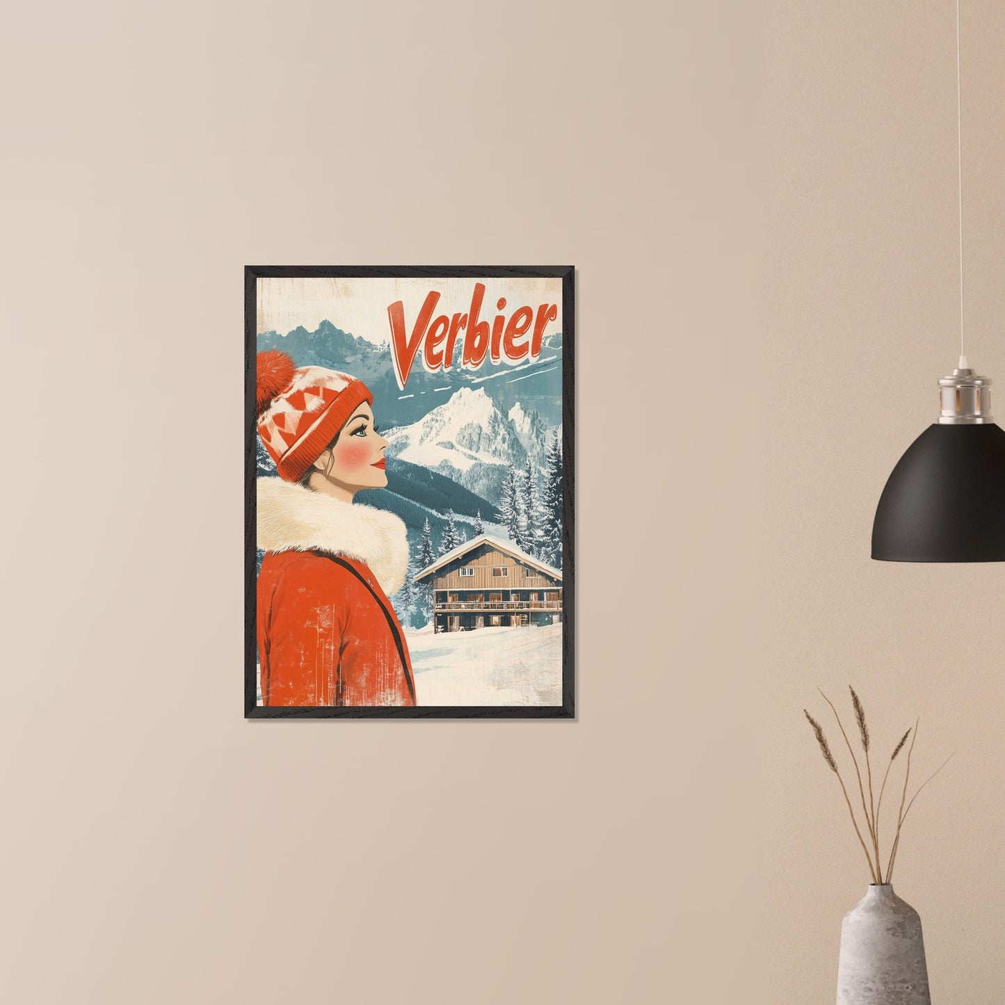 This elegant retro-style poster features a woman in a stylish red winter coat and pom-pom hat, looking towards the majestic Verbier mountains. The soft pastel tones and crisp white snow provide a serene backdrop, while the vintage design and typography evoke a sense of sophistication and timeless charm. The poster conveys the allure of Verbier as both an adventure and a refined escape into nature’s beauty.